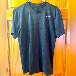 Nike Dry Fit Size Medium gray tee shirt. Very light material. Gently worn.